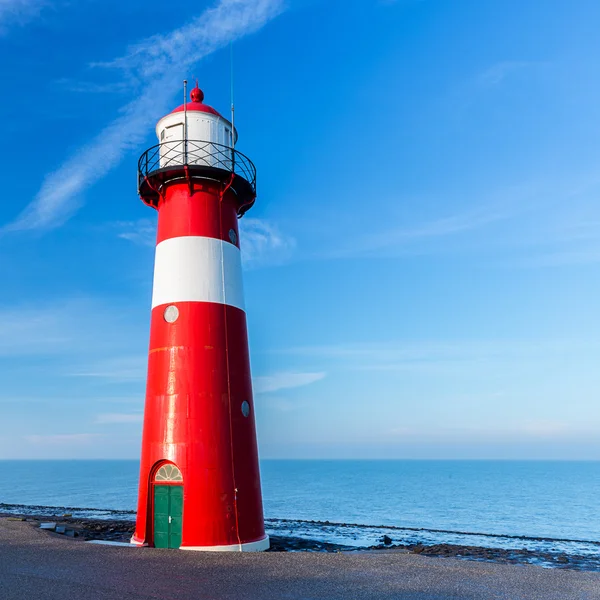 Lighthouse at the ocean — Stock Photo, Image