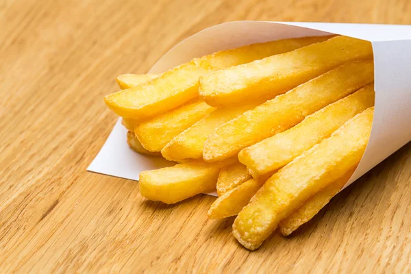 Pommes Frites fries in a bag — Stock Photo, Image