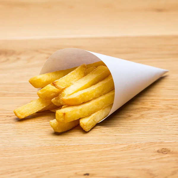 Pommes frites potatis i en påse — Stockfoto