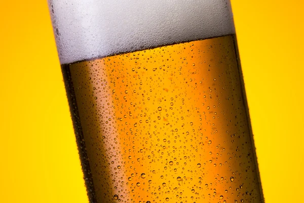 Cold beer glass with dew drops — Stock Photo, Image