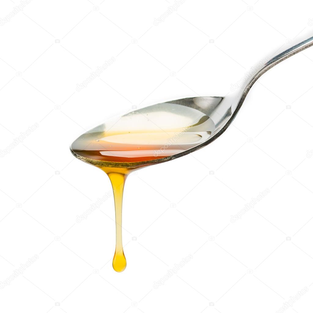 Spoon with honey drop