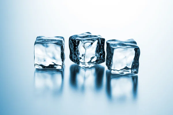 Three clear ice cubes — Stock Photo, Image