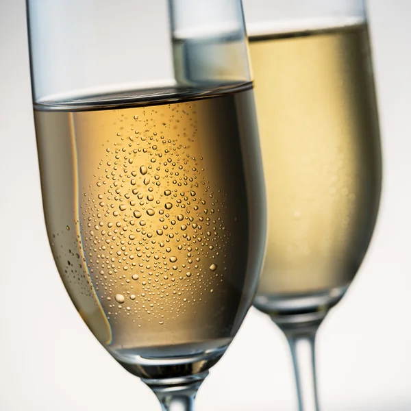 Cold champagne glasses with dew — Stock Photo, Image