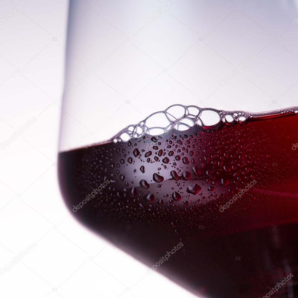 Close-up from a cold red wine glass
