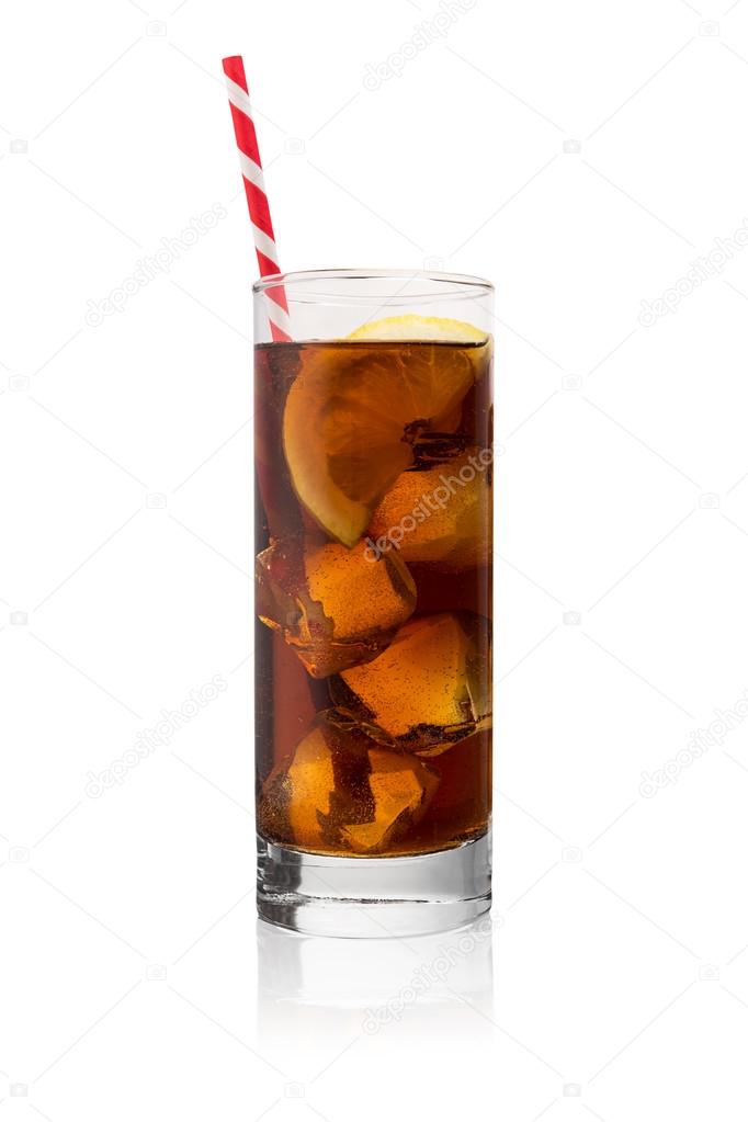 Cola drink in a glass with ice cubes and straw