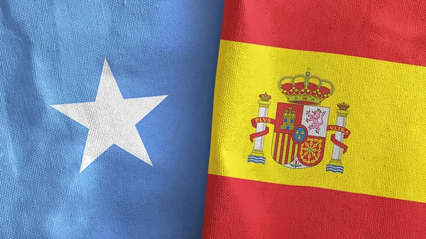 España y Somalia dos banderas de tela textil 3D renderizado — Foto de Stock