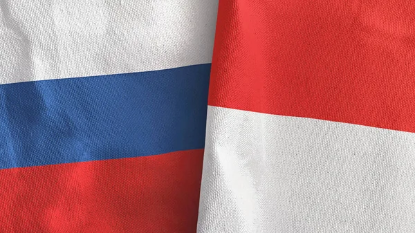 Indonesia y Rusia dos banderas de tela textil representación 3D — Foto de Stock