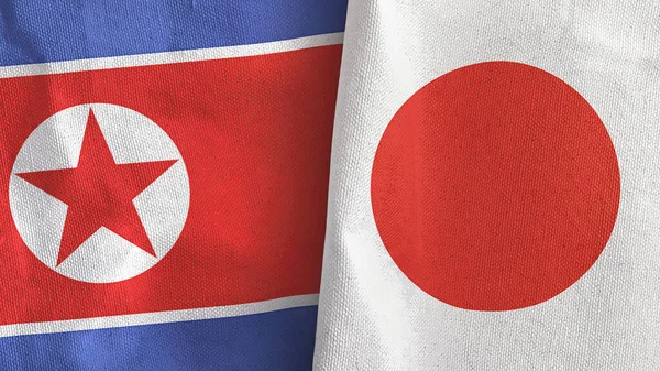 Japón y Corea del Norte dos banderas tela textil 3D renderizado — Foto de Stock