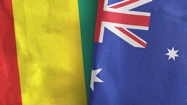 Australia y Guinea dos banderas de tela textil 3D renderizado — Foto de Stock