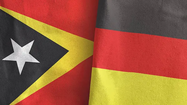 Alemania y Timor Oriental Timor Oriental dos banderas de tela textil 3D renderizado —  Fotos de Stock