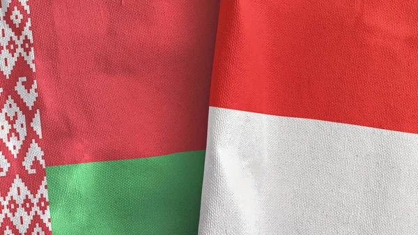 Indonesia y Bielorrusia dos banderas de tela textil 3D renderizado — Foto de Stock