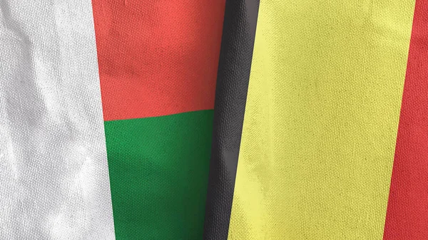 Belgien och Madagaskar två flaggor textilduk 3D-rendering — Stockfoto