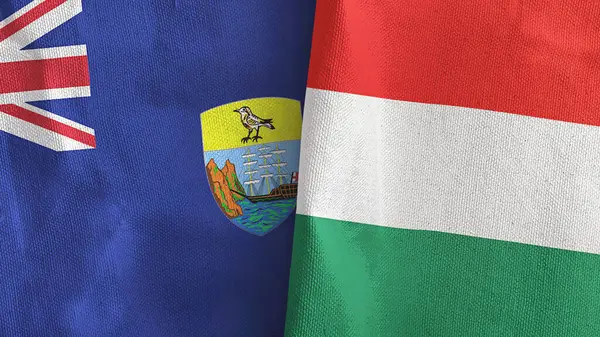 Hungría y Santa Helena dos banderas de tela textil 3D renderizado — Foto de Stock