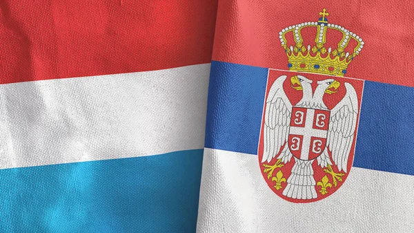 Serbia i Luksemburg dwie flagi tkaniny tekstylne 3D renderowania — Zdjęcie stockowe