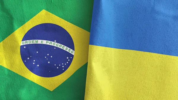 Oekraïne en Brazilië twee vlaggen textiel doek 3D rendering — Stockfoto
