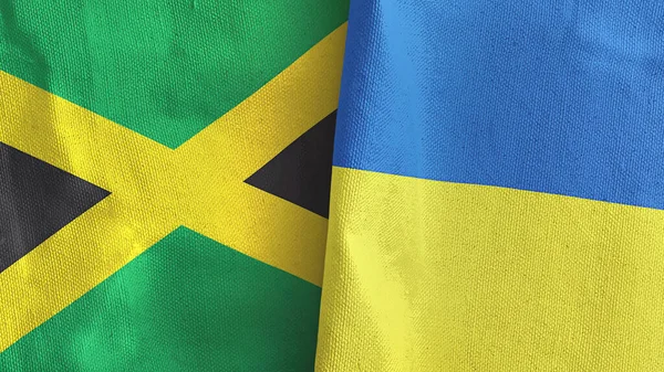 Украина и Ямайка два флага текстильная ткань 3D рендеринг — стоковое фото