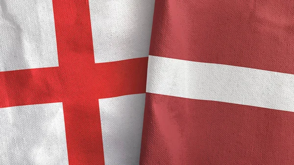 Letonia e Inglaterra dos banderas de tela textil representación 3D —  Fotos de Stock