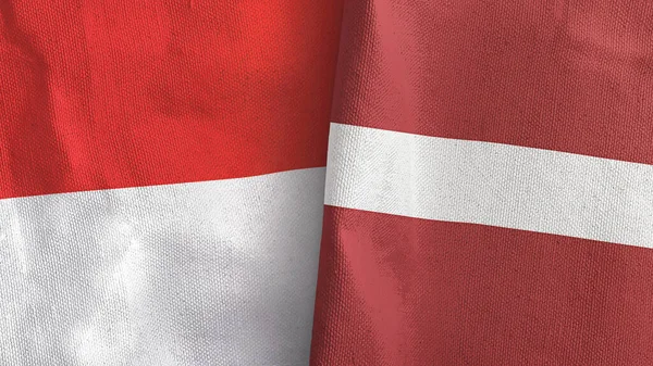 Latvia and Indonesia two flags textile cloth 3D rendering — Stock Photo, Image