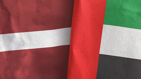 Об "єднані Арабські Емірати та Латвія мають два прапори текстильного одягу 3D рендеринга — стокове фото