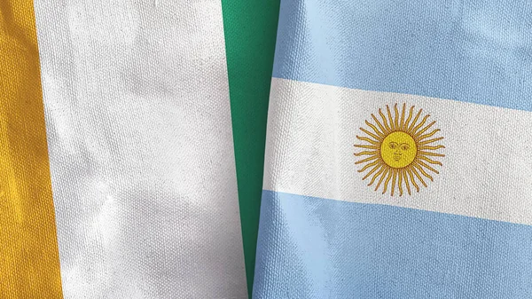 Argentina y Costa de Marfil Costa de Marfil dos banderas tela 3D renderizado — Foto de Stock