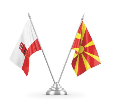 Kuzey Makedonya ve Cebelitarık masa bayrakları üç boyutlu beyaz renge izole edildi