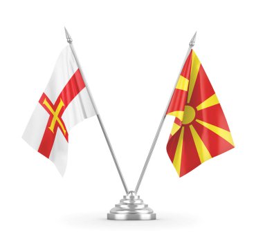 Kuzey Makedonya ve Guernsey masa bayrakları beyaz 3D görüntülere izole edildi