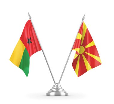 Kuzey Makedonya ve Gine-Bissau masa bayrakları beyaz 3D görüntülere izole edildi