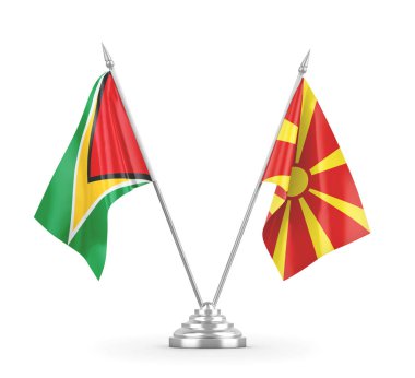 Kuzey Makedonya ve Guyana masa bayrakları beyaz 3D görüntülere izole edildi