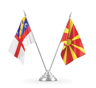 Kuzey Makedonya ve Herm masa bayrakları beyaz 3D görüntüleme üzerinde izole edildi
