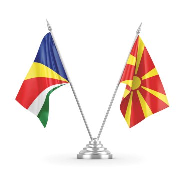 Kuzey Makedonya ve Seyşeller masa bayrakları beyaz 3D görüntülere izole edildi