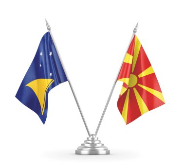 Kuzey Makedonya ve Tokelau masa bayrakları beyaz 3D görüntülere izole edildi