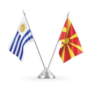 Kuzey Makedonya ve Uruguay masa bayrakları beyaz 3D görüntülere izole edildi