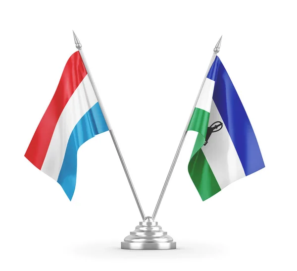 Lesotho en Luxemburg tafelvlaggen geïsoleerd op witte 3D rendering — Stockfoto