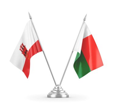 Madagaskar ve Gibraltar masa bayrakları beyaz 3D görüntüleme üzerinde izole