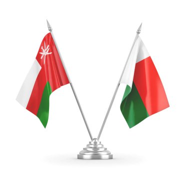 Madagaskar ve Umman masa bayrakları beyaz 3D görüntüleme üzerinde izole