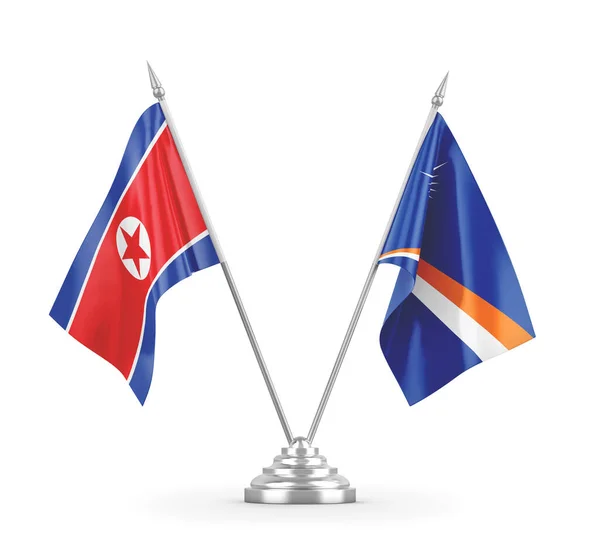 Marshall Islands and North Korea table flags isolated on white 3D rendering — Stock Photo, Image