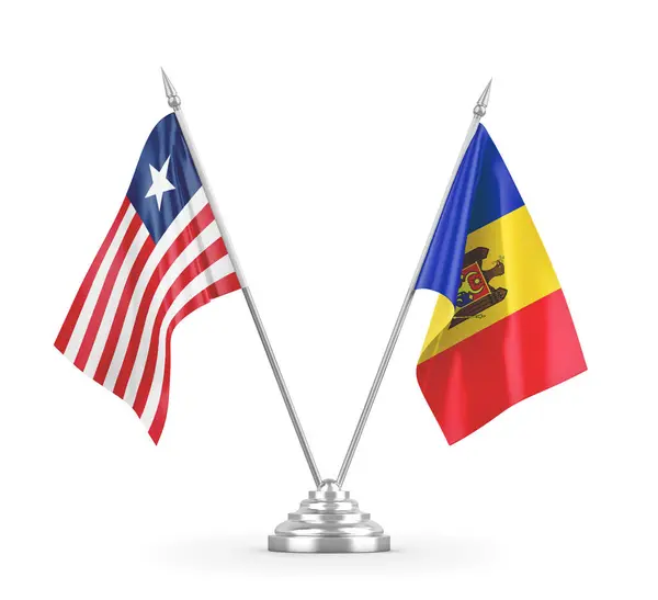 Moldavien och Liberia bordsflaggor isolerade på vit 3D-rendering — Stockfoto