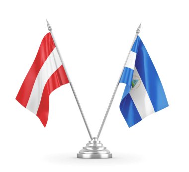 Nikaragua ve Avusturya bayrakları beyaz 3D görüntüleme üzerinde izole edildi