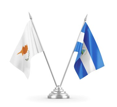 Nikaragua ve Kıbrıs masa bayrakları beyaz 3D görüntüleme üzerinde izole edildi