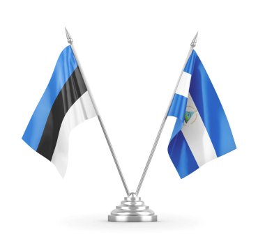 Nikaragua ve Estonya masa bayrakları beyaz 3D görüntüleme üzerinde izole edildi