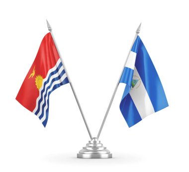 Nikaragua ve Kiribati masa bayrakları beyaz 3D görüntüleme üzerinde izole edildi