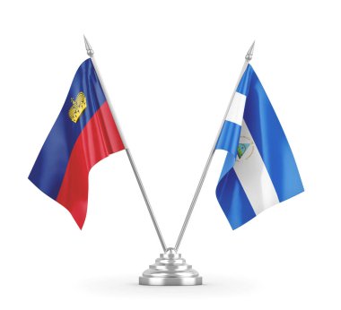 Nikaragua ve Lihtenştayn masa bayrakları beyaz 3D görüntüleme üzerinde izole edildi