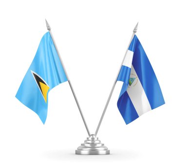 Nikaragua ve Saint Lucia masa bayrakları beyaz 3D görüntüleme üzerinde izole edildi