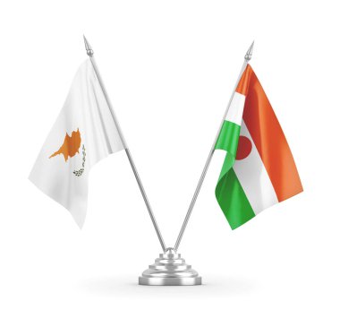 Nijer ve Kıbrıs masa bayrakları beyaz 3D görüntüleme üzerinde izole edildi