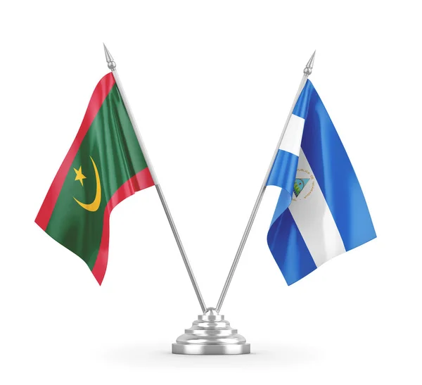 Banderas de mesa Nicaragua y Mauritania aisladas en renderizado 3D blanco — Foto de Stock