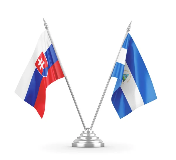 Nicaragua and Slovakia table flags isolated on white 3D rendering — Stock Photo, Image