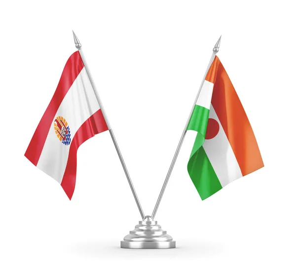 Banderas de mesa de Níger y Polinesia Francesa aisladas en renderizado 3D blanco — Foto de Stock