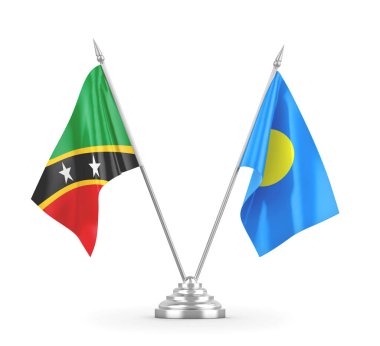 Palau, Saint Kitts ve Nevis masa bayrakları beyaz 3D görüntülerde izole edilmiş.