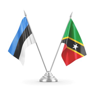 Saint Kitts, Nevis ve Estonya masa bayrakları beyaz 3D görüntüleme üzerinde izole edildi