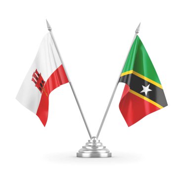 Saint Kitts, Nevis ve Cebelitarık masa bayrakları beyaz 3D görüntülerde izole edilmiş.